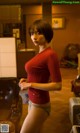 A woman in a red sweater is posing for a picture.